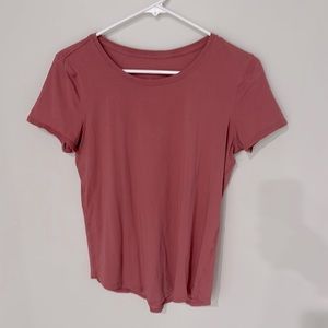 LuluLemon size 8, pretty pink color, short sleeve T-shirt